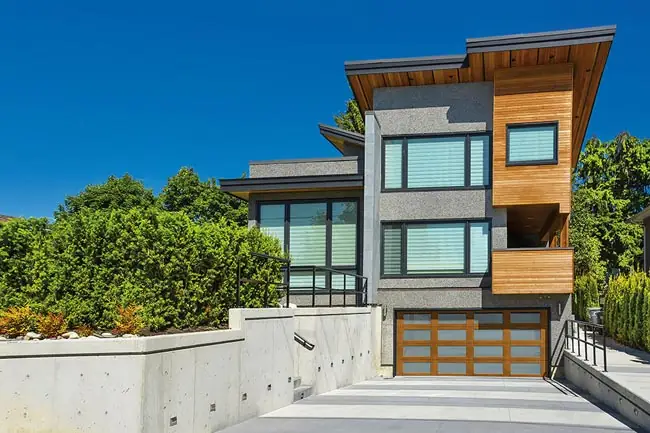Clopay Canyon Ridge Modern series garage door with faux wood overlays