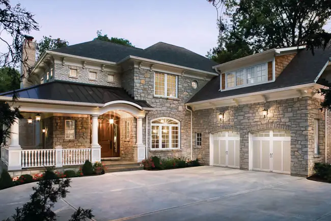 Coachman Collection — Steel Insulated with Composite Overlay garage door by Clopay