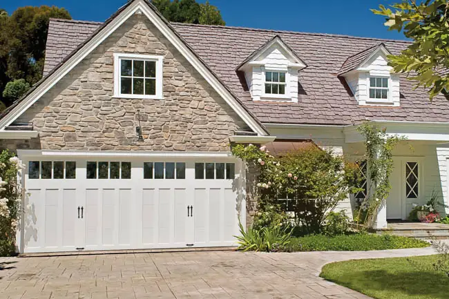 Coachman Collection — Steel Insulated with Composite Overlay garage door by Clopay