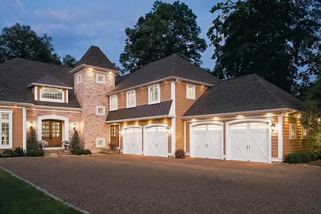Coachman Collection — Steel Insulated with Composite Overlay garage door by Clopay