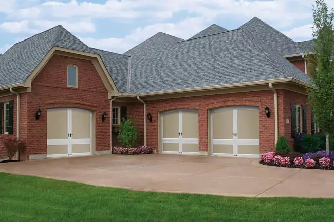 Coachman Collection — Steel Insulated with Composite Overlay garage door by Clopay