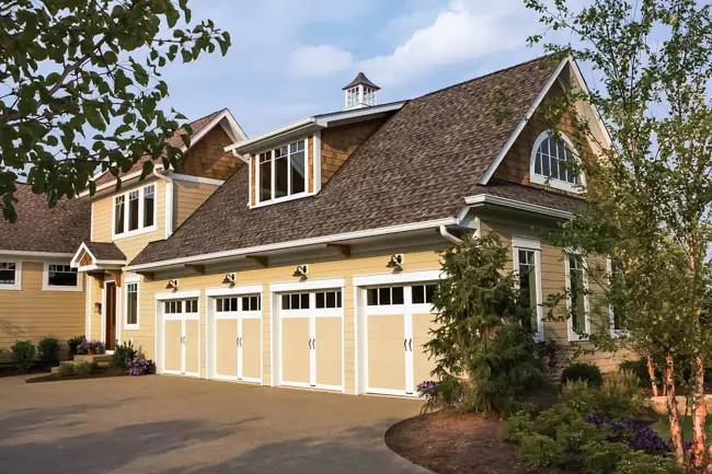 Coachman Collection — Steel Insulated with Composite Overlay garage door by Clopay