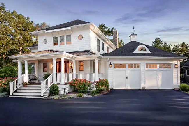 Coachman Collection — Steel Insulated with Composite Overlay garage door by Clopay
