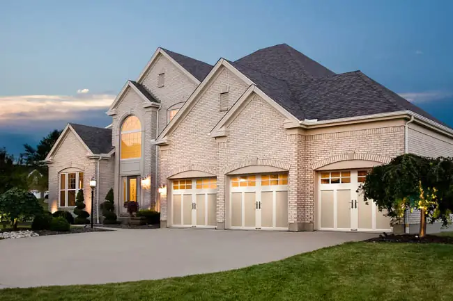 Coachman Collection — Steel Insulated with Composite Overlay garage door by Clopay