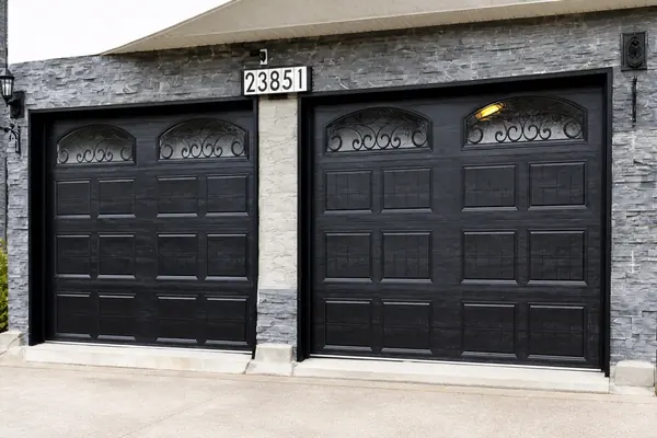 Black Gallery Doors, Short Panel, with Wrought Iron Windows.