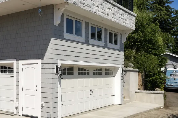 Gallery doors by Clopay can give you a carriage house look, by adding windows and hardware.